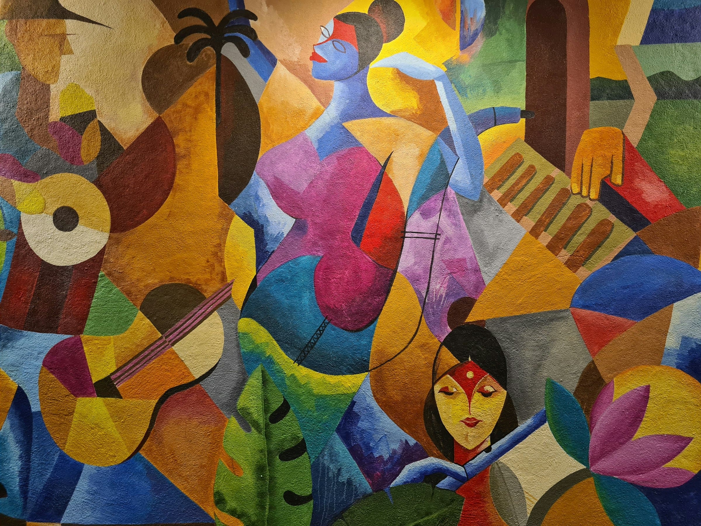 A bold, colourful painting of musicians and figures.